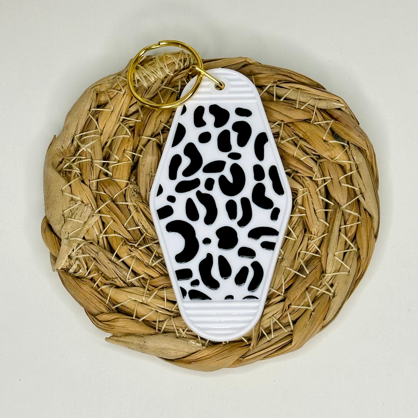 White Leopard Print Hotel Keychain