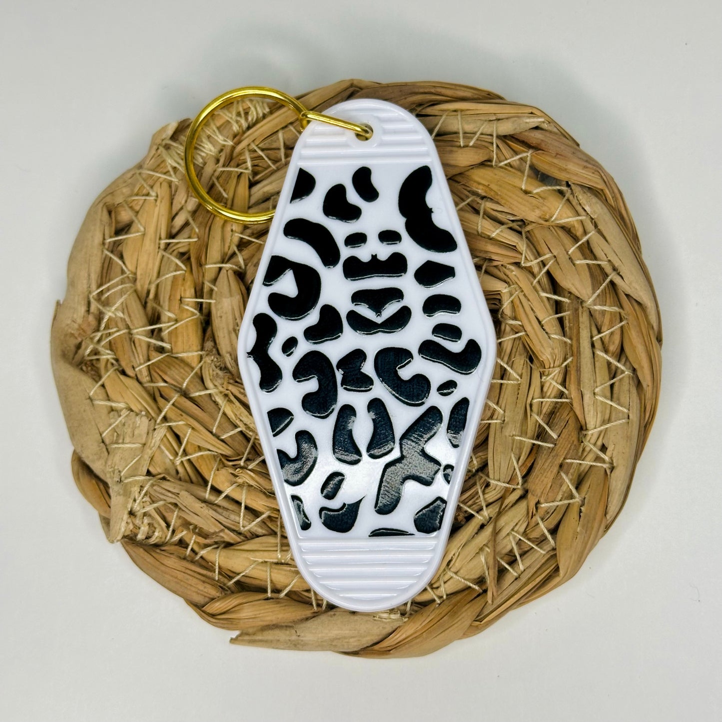 White Leopard Print Hotel Keychain